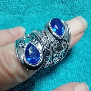 Elegant Silver Tone and Blue Stone Ring detail intricate